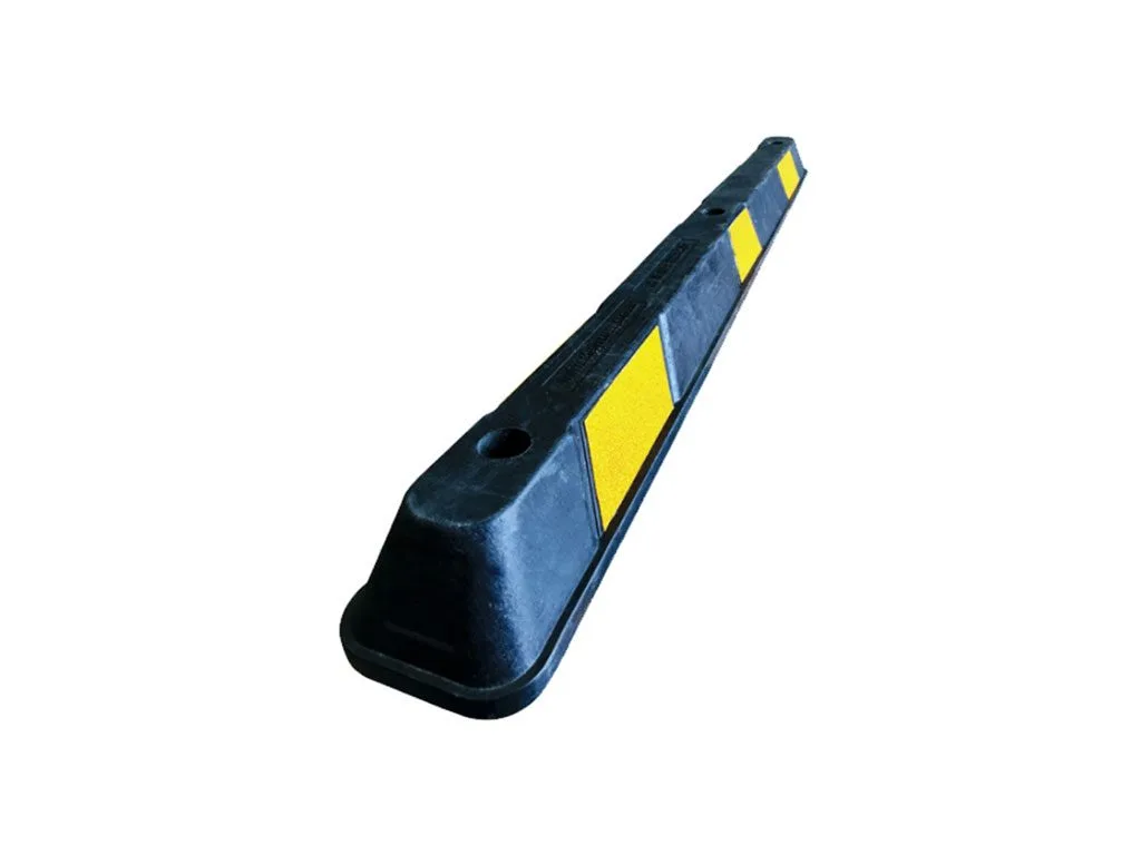 Verge durable rubber wheel stop installed in a carpark